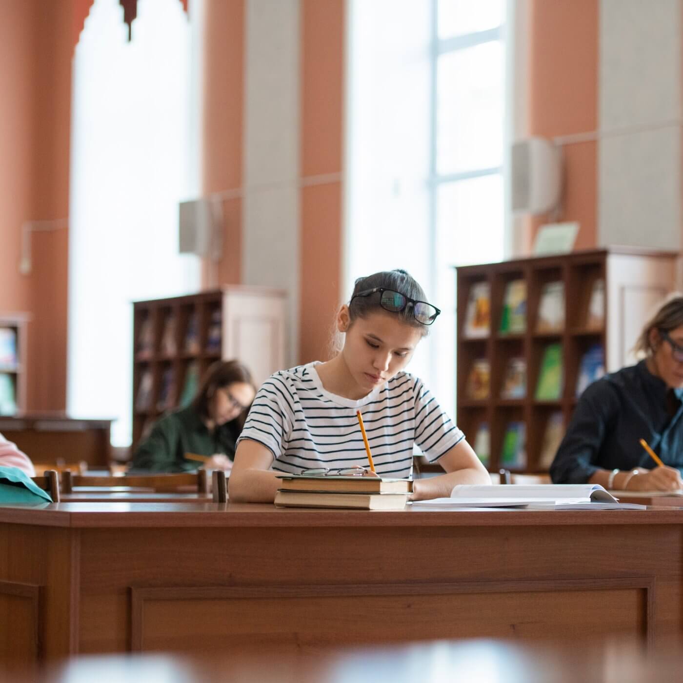 Students studying in a university library